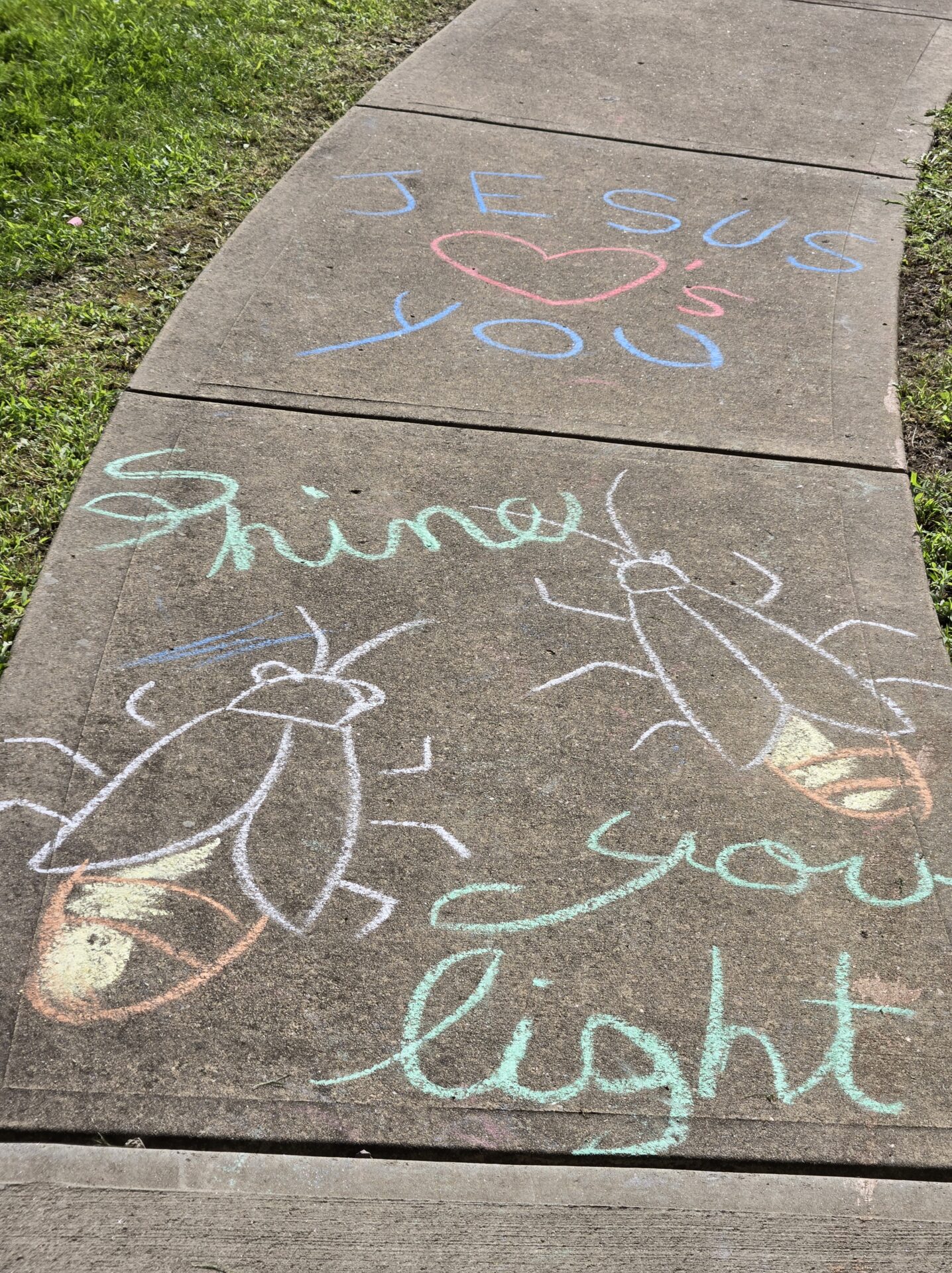 Sidewalk chalk art from the 2025 BAC community day event