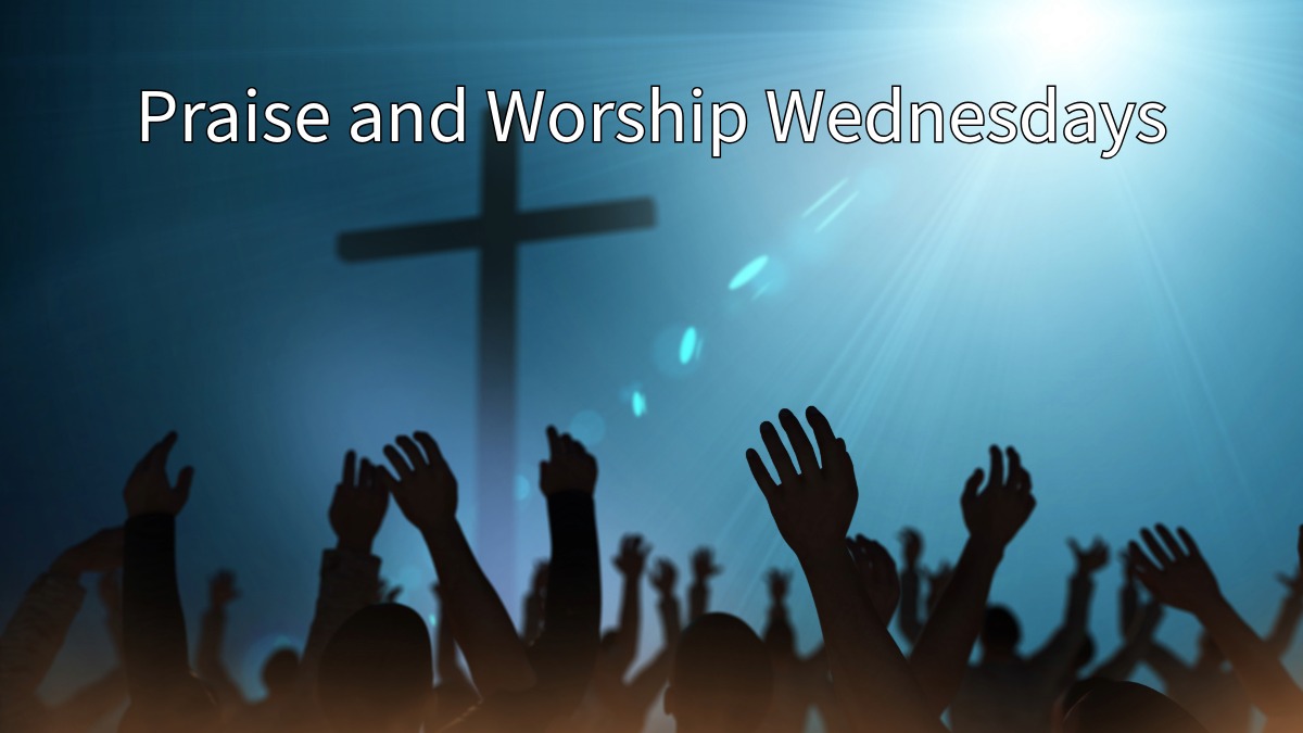 People raising their hands in worship